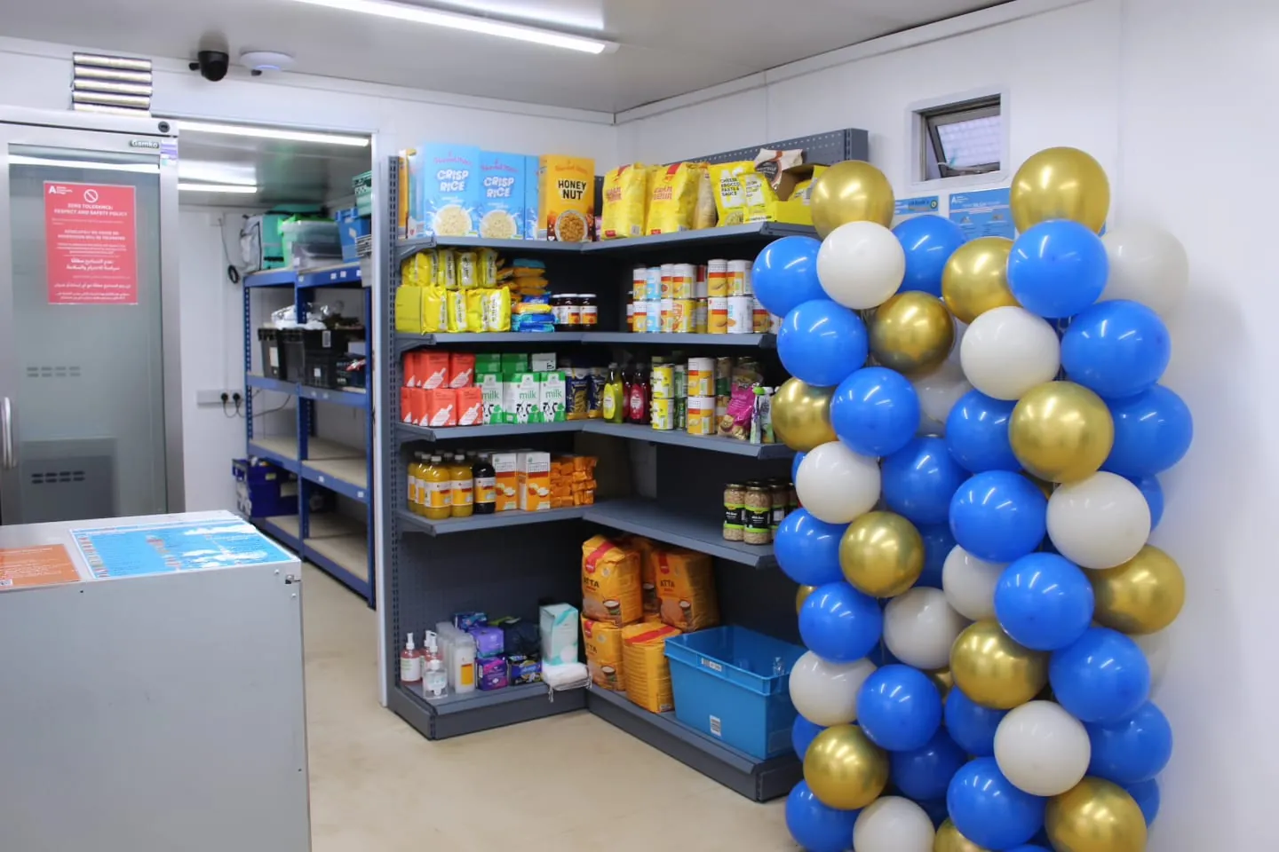 The stocked aisle inside the cabin